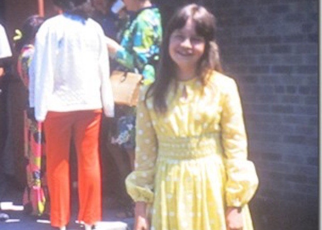 Even Sue had to wear a ridiculous graduation dress...